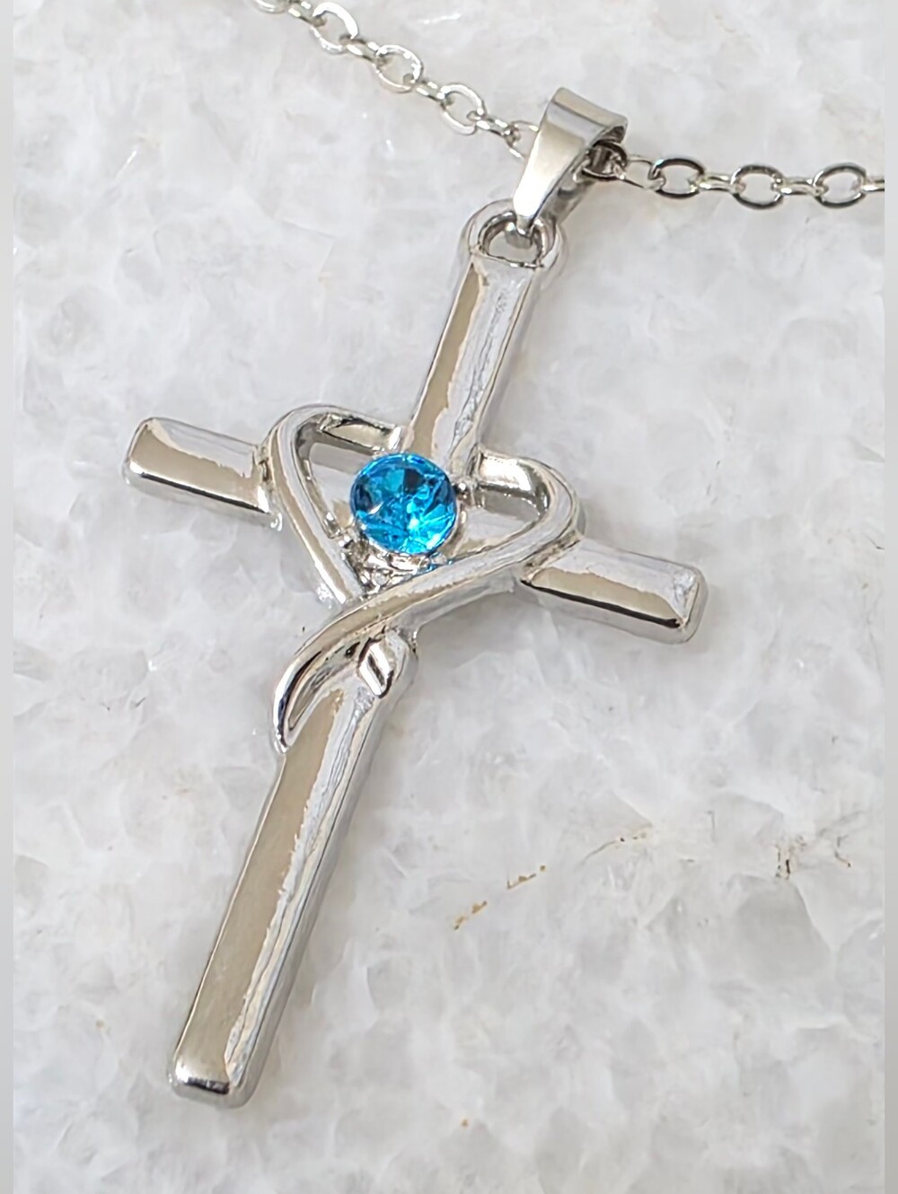Silver Cross Pendant Necklace with Blue Heart Gem